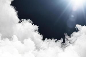 Overlay with sky  cloud and sun lights on a black background. White smoke or fog. photo