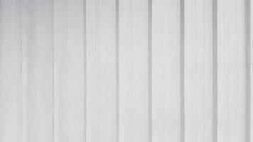 Pattern line of Grey stainless steel background. Gray shutter door wall. Shinny white zinc wallpaper or curtain. photo