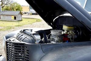 under the hood of an old vehicle photo