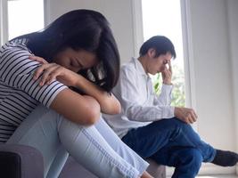 Couples are bored, stressed, upset and irritated after quarreling. Family crisis and relationship problems that come to an end photo