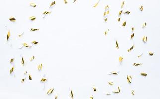 Abstract golden confetti frame for background and copy space photo