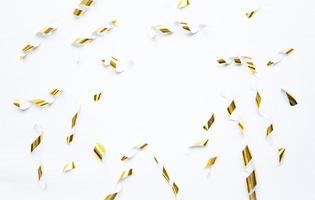 Golden confetti for celebration and party background photo
