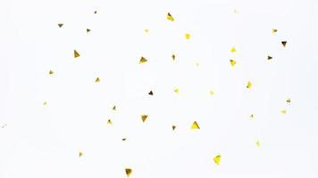 Abstract golden confetti for background and wallpaper. Luxury shiny pattern photo