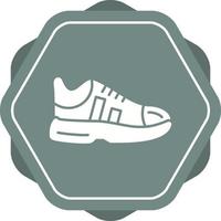 icono de vector de zapatillas