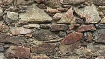 Texture of a stone wall. Old castle stone wall texture background. video