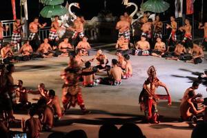 Kecak dance performance on Melasti Beach, bali, Indonesia photo