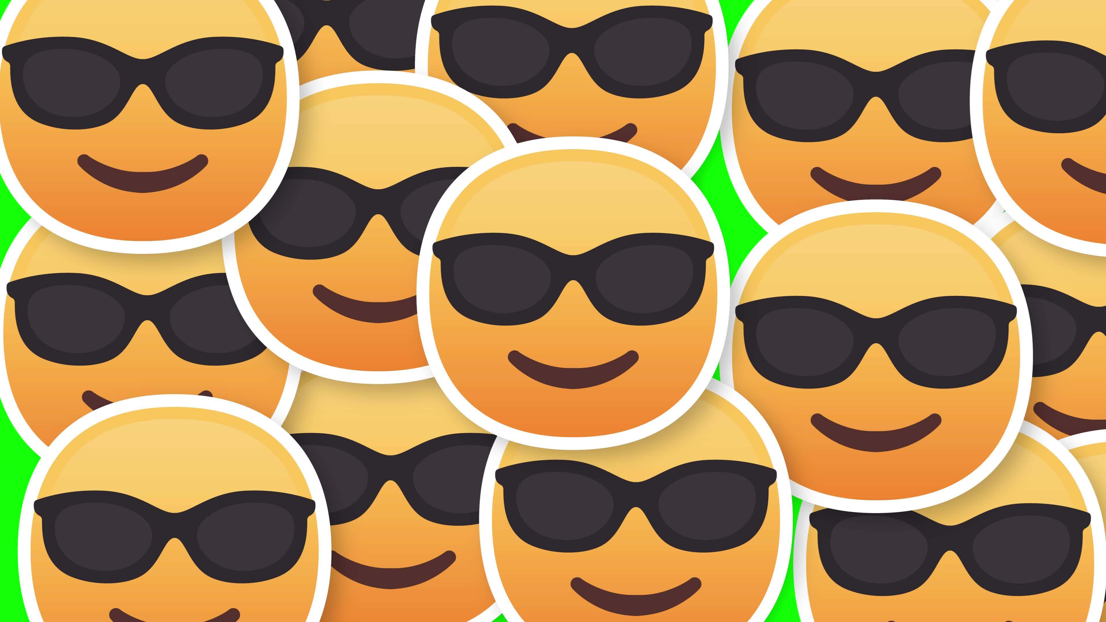 face with sunglasses emoji horizontal transition green screen 17360307