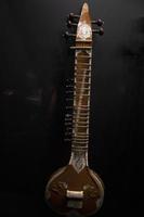 sitar isolated on black photo