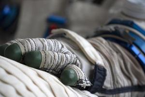 Astronaut space suit gloves close up photo