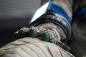 Astronaut space suit gloves close up photo