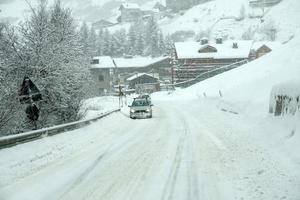 snow tempest on italian alps photo