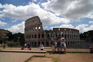 ROME, ITALY - JUNE 10 2018 -  Tourists taking pictures and selfies at colosseo photo