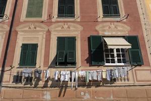 camogli house clothes drying to the sun photo