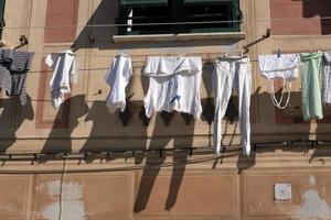 camogli house clothes drying to the sun photo