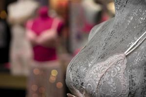 woman bra on a mannequin inside a shop photo