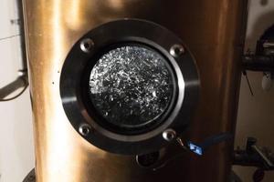 Copper still alembic inside distillery photo