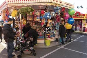 GENOA, ITALY - DECEMBER, 9 2018 - Traditional Christmas Luna Park Fun Fair is opened photo