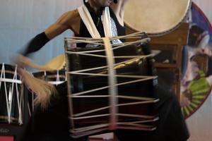 Japanese drummer in action photo