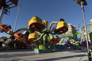 GENOA, ITALY - DECEMBER, 9 2018 - Traditional Christmas Luna Park Fun Fair is opened photo