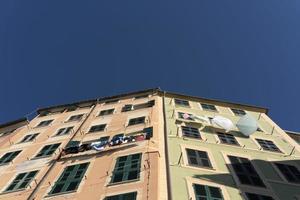 camogli house clothes drying to the sun photo