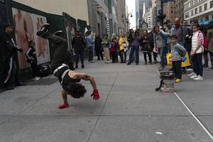 NEW YORK, USA - MAY 7 2019 - Break dancer in 5th avenue photo