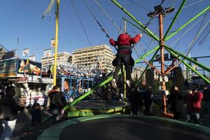 GENOA, ITALY - DECEMBER, 9 2018 - Traditional Christmas Luna Park Fun Fair is opened photo