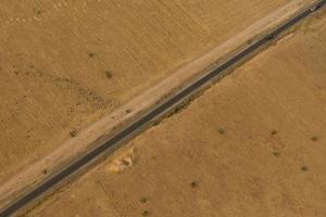 Maroc road in the desert near Marrakech aerial view photo