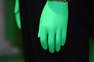 green hand on animal fur clothes detail photo