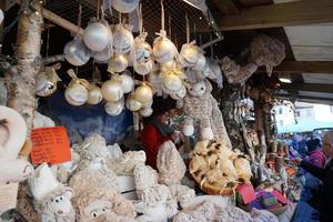 TRENTO, ITALY - DECEMBER 9, 2017 - People at traditional christmas market photo