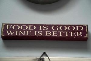 food is good wine is better sign photo