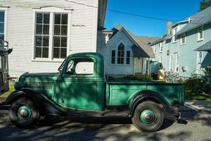 old vehicle out of martha vineyard gingerbread colorful houses photo