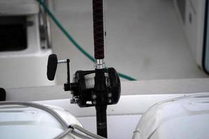 fishing rod on a boat photo