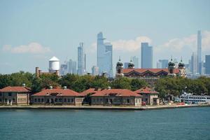 ellis island new york view cityscape from hudson river liberty island photo