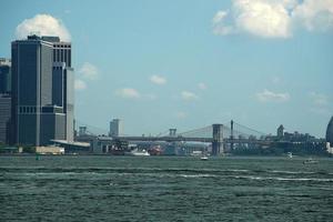 new york view cityscape from hudson river liberty island photo