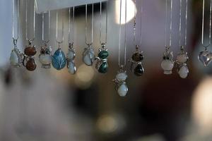 many stone pendant at the market photo