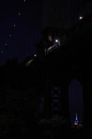 vista nocturna de la ciudad de nueva york desde dumbo foto
