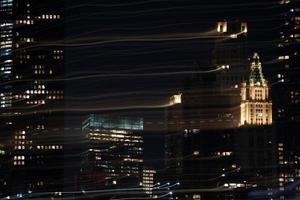 vista nocturna de la ciudad de nueva york desde dumbo foto