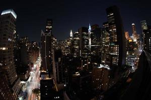 new york city night aerial cityscape from terrace rooftop photo