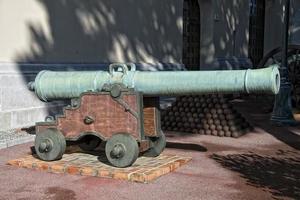 Medieval iron Cannon with ammo photo