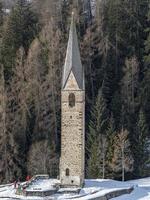 La valle La val dolomites mountain church in winter photo