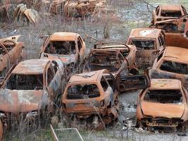 junkyard old rusted car field photo