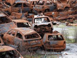 junkyard old rusted car field photo