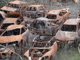 junkyard old rusted car field photo