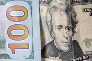 wooden hand holding dollars close up detail macro photo