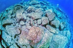 diving in rocks with no reef underwater photo