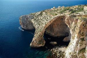 malta blue grotto arch by the sea aerial photo