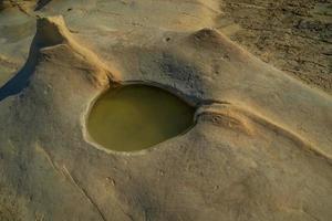 saint peter pools Malta rock formation hole on rocks photo