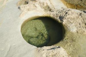 saint peter pools Malta rock formation hole on rocks photo