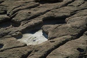 saint peter pools Malta rock formation hole on rocks photo