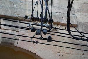 Malta electric wires hanging on building photo
